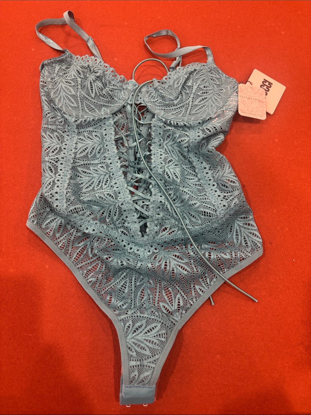 NEW Free People Crochet Lace-Up One-Piece camisole in blue sea color.
